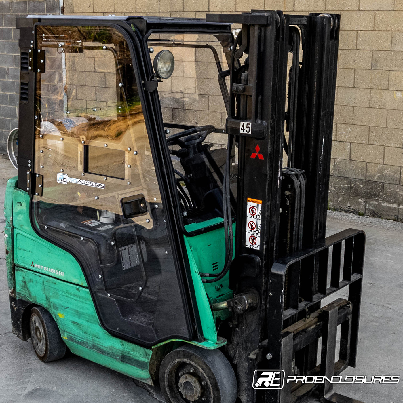 Mitsubishi forklift cab enclosure on dock